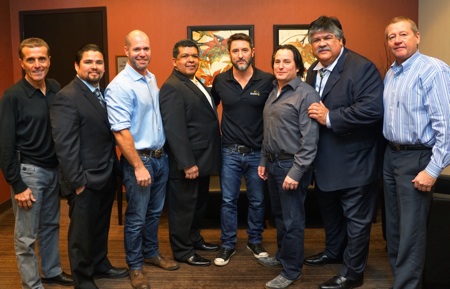 Pictured left to right: Tony Guanci (DWP Board Member), Calvin Moman (UAIC Council Member at Large; DWP Board Member), Damon D'Arienzo (DWP CFO), Danny Rey (UAIC Tribal Secretary; DWP Board Member), Danny Wimmer (DWP Founder and Chairman), Danny Hayes (DWP CEO), Gene Whitehouse (UAIC Chairman), Peter Luukko (DWP Board Member)